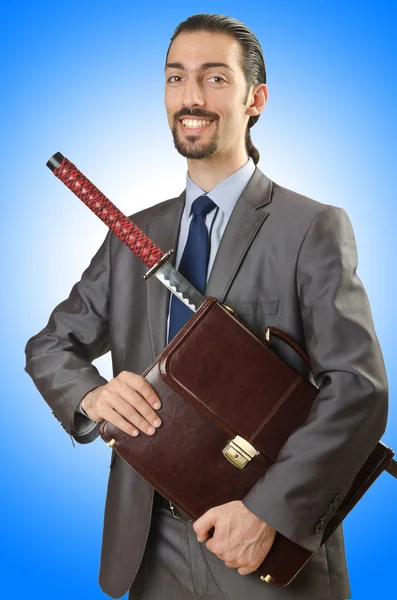 Succsessful Businessman with sword — Stock Photo, Image
