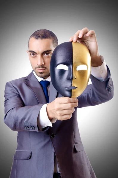 Obchodní muž s maskou — Stock fotografie