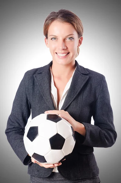 Business woman with football — Stock Photo, Image