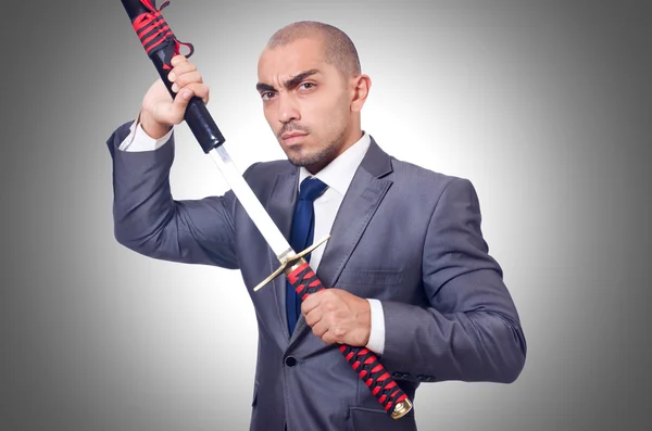 Business man with sword — Stock Photo, Image