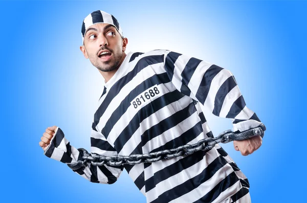 Convict criminal in striped uniform — Stock Photo, Image