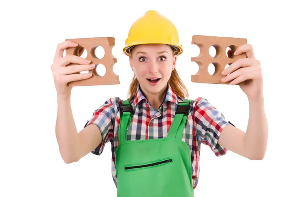 Woman with bricks isolated on white — Stock Photo, Image