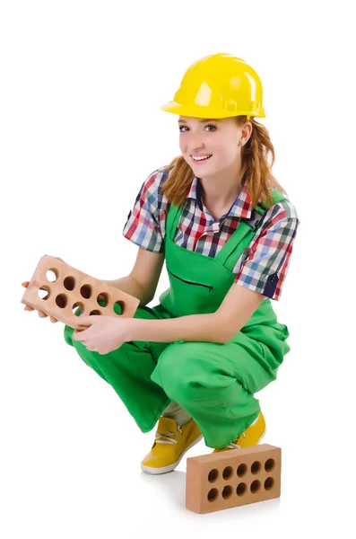 Woman with bricks isolated on white — Stock Photo, Image