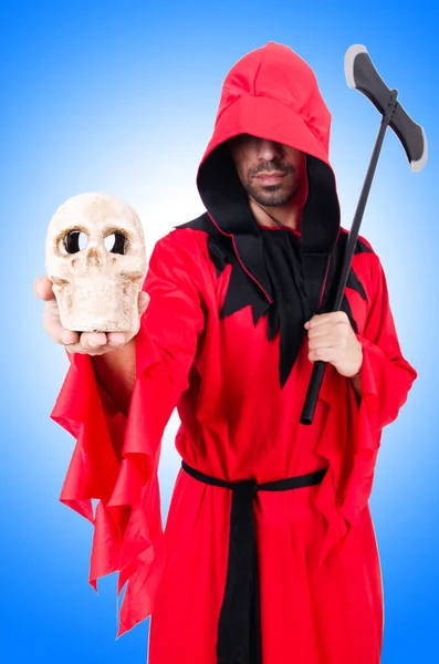 Executioner in red costume with axe — Stock Photo, Image