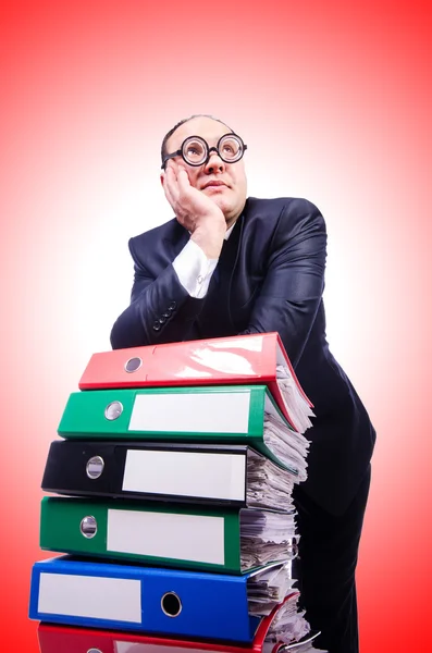 Funny man with lots of folders — Stock Photo, Image