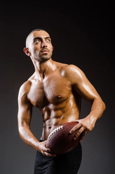 Muscular football player — Stock Photo, Image