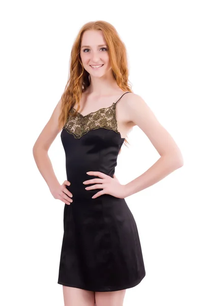 Een meisje in elegante zwarte mini jurk geïsoleerd op wit — Stockfoto