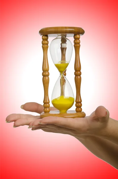 Hand holding hourglass — Stock Photo, Image