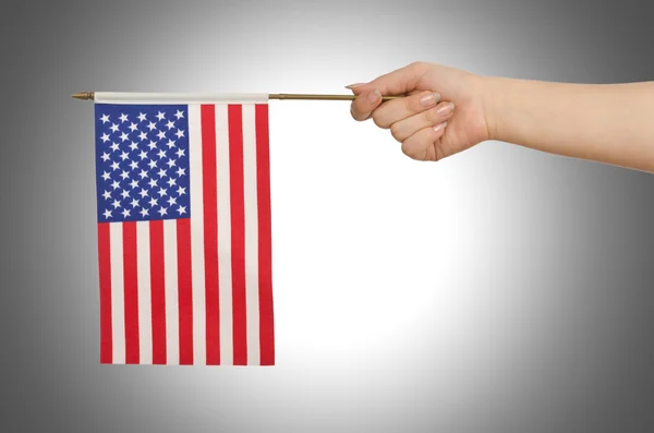 Hand houden van Amerikaanse vlag — Stockfoto