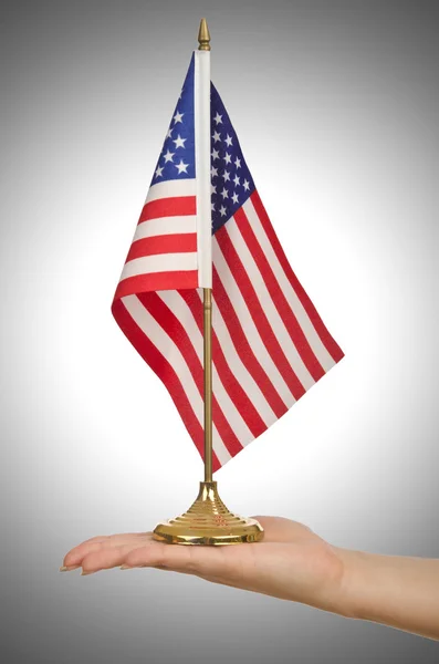 Hand mit amerikanischer Flagge — Stockfoto