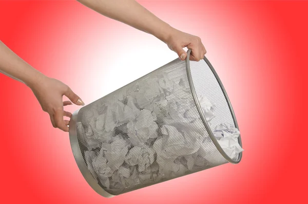 Hands with garbage bin with paper — Stock Photo, Image