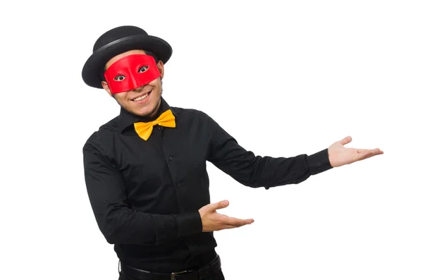 Jongeman in zwart kostuum en rood masker geïsoleerd op wit — Stockfoto