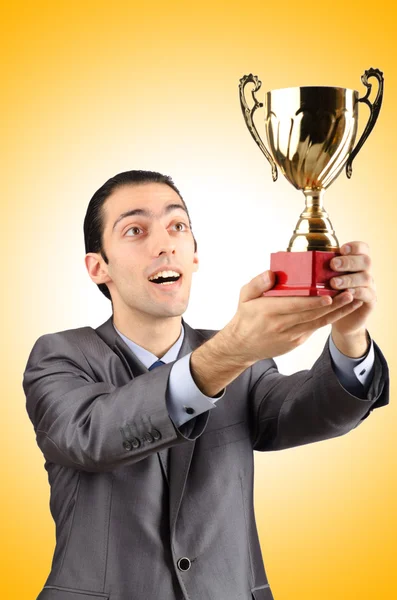 Man being awarded with golden cup — Stock Photo, Image