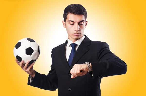 Young businessman with football — Stock Photo, Image