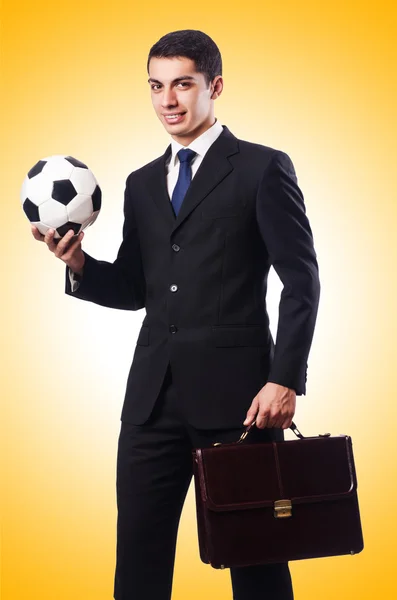 Young businessman with football — Stock Photo, Image