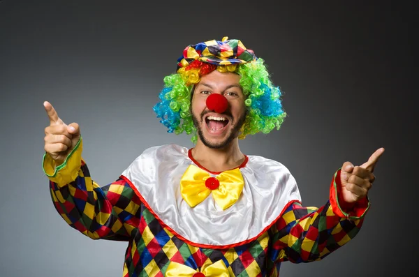 Funny clown in colorful costume — Stock fotografie