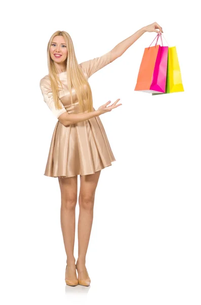 Mulher muitos sacos de compras depois de fazer compras isolado no branco — Fotografia de Stock
