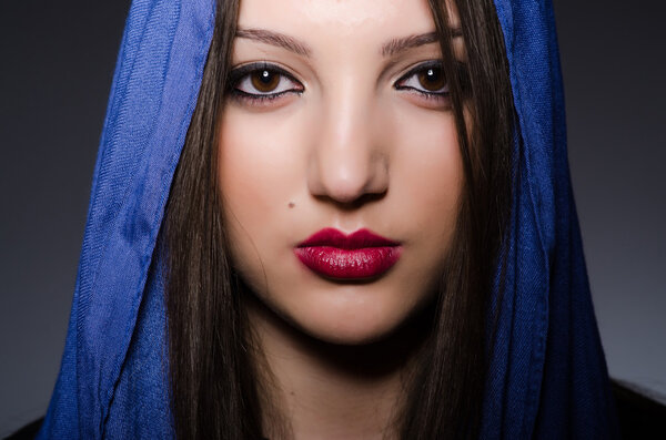 Young woman with headscarf