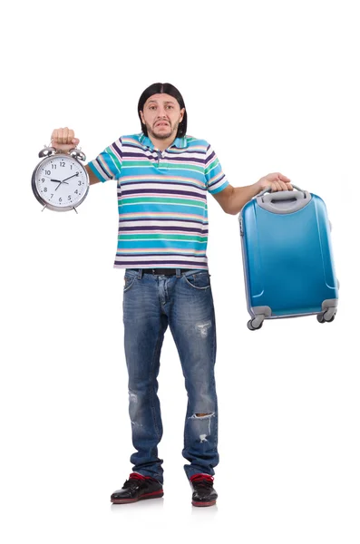 Молодой человек с чемоданом изолирован на белом — стоковое фото