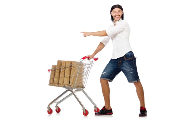 Uomo shopping con carrello supermercato isolato su bianco — Foto Stock