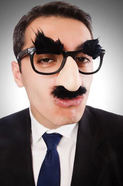 Empresário engraçado com sobrancelhas e bigode — Fotografia de Stock
