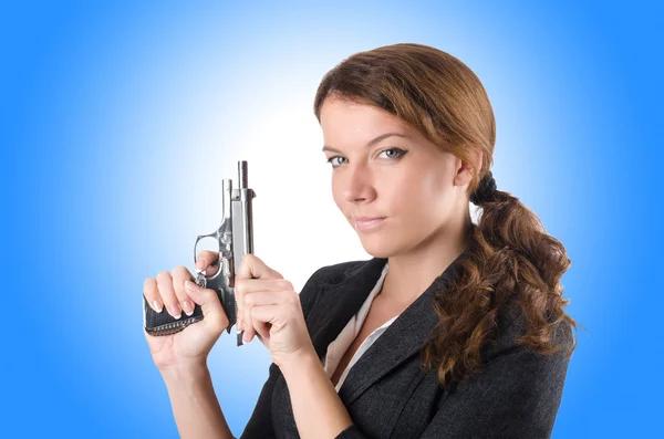 Businewoman with handgun — Stock Photo, Image