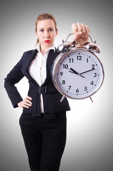 Woman with giant clock — Stock Photo, Image
