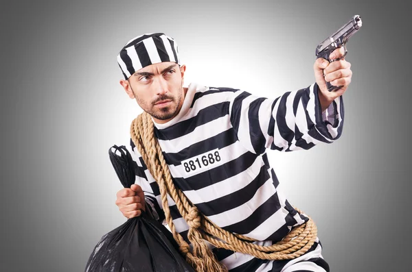 Verurteilter Verbrecher in gestreifter Uniform — Stockfoto