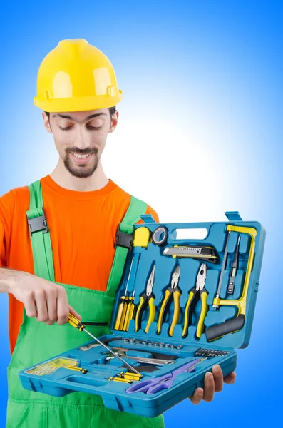 Repairman in coveralls in industrial concept Stock Picture