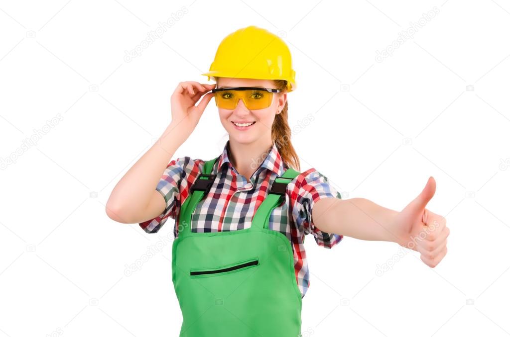 Female handyman in overalls isolated on white