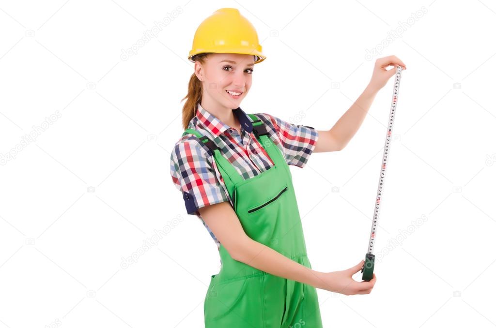 Female handyman in overalls isolated on white