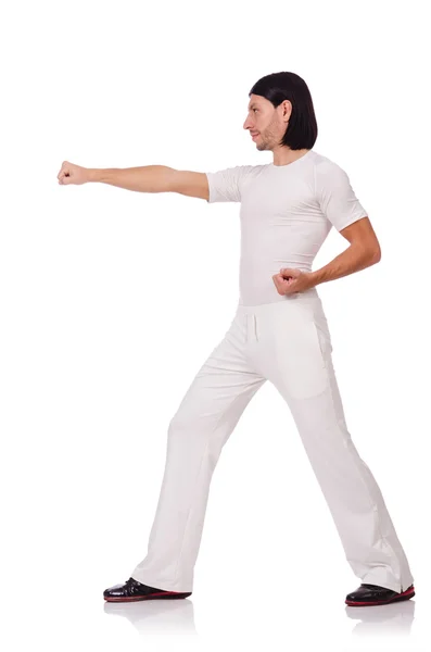 一个穿着白色运动服的男人被隔离在白色的衣服上 — 图库照片