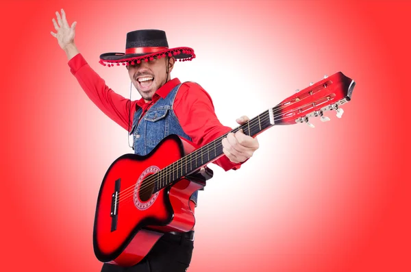 Guitarrista contra o gradiente — Fotografia de Stock