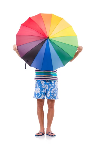 Uomo positivo con ombrello colorato isolato su bianco — Foto Stock