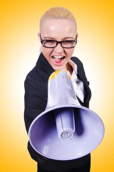 Young businesswoman with loudspeaker — Stock Photo, Image