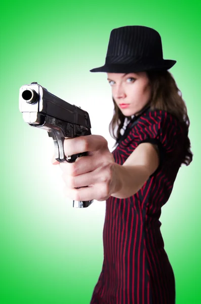 Woman gangster with handgun on white — Stock Photo, Image