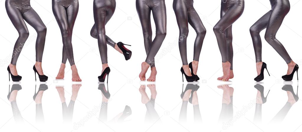 Woman legs isolated on the white background