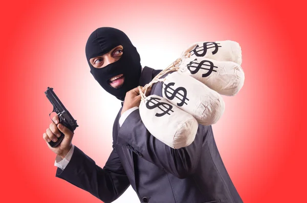 Gangster with bags of money — Stock Photo, Image