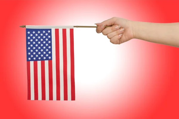 Hand houden van Amerikaanse vlag — Stockfoto