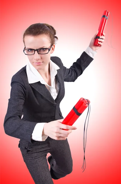 Business woman with dynamite — Stock Photo, Image