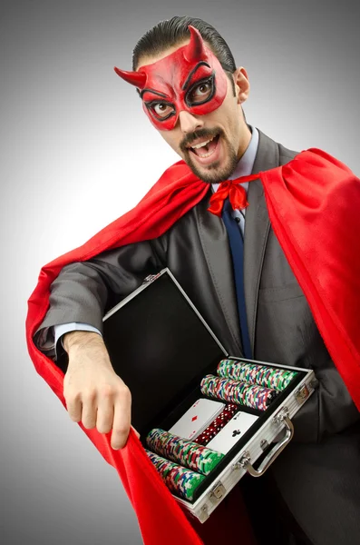 Superman i kostym med poker — Stockfoto