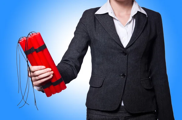 Hand holding bars of dynamite — Stock Photo, Image