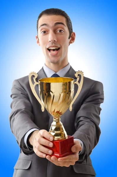 Man being awarded with golden cup — Stock Photo, Image