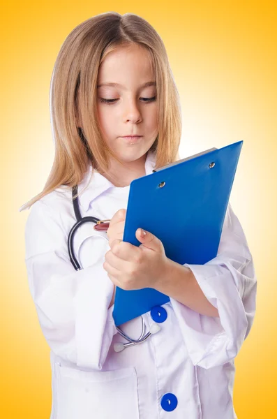 Little girl in doctor costume — Stock Photo, Image