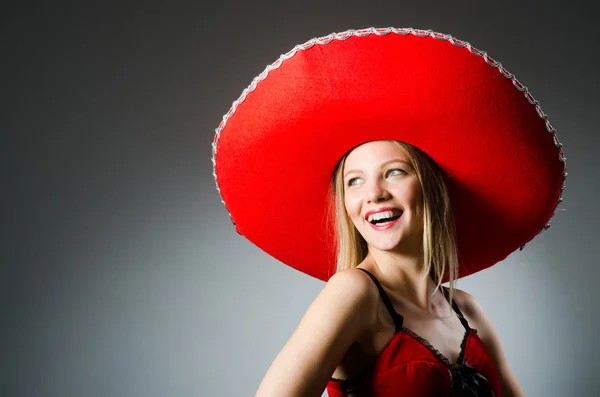 Woman wearing sombrero hat — Stock Photo, Image