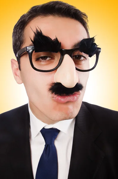 Biznesmen zabawna z brwiami i wąsy — Zdjęcie stockowe