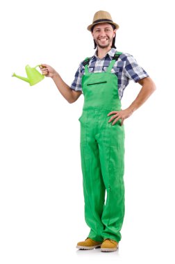 Genç, neşeli bahçıvan, sulu teneke kutusunu beyaza sarmış.