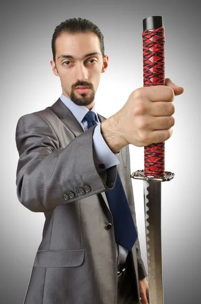 Business man with sword — Stock Photo, Image