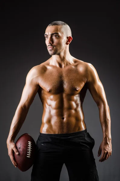 Muscular football player — Stock Photo, Image