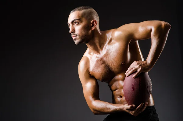Muskulös fotbollsspelare — Stockfoto